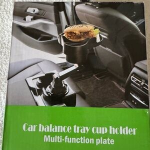 New in box Multi function plate and cup holder for your vehicle.